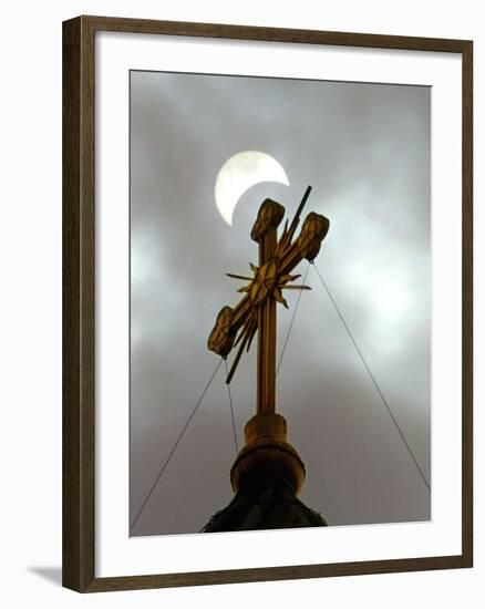 The Moon Partially Covers the Sun During a Partial Solar Eclipse-null-Framed Photographic Print