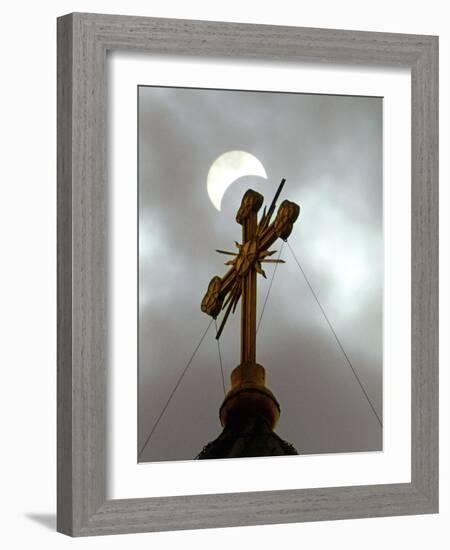 The Moon Partially Covers the Sun During a Partial Solar Eclipse-null-Framed Photographic Print