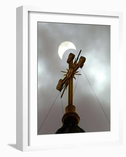 The Moon Partially Covers the Sun During a Partial Solar Eclipse-null-Framed Photographic Print