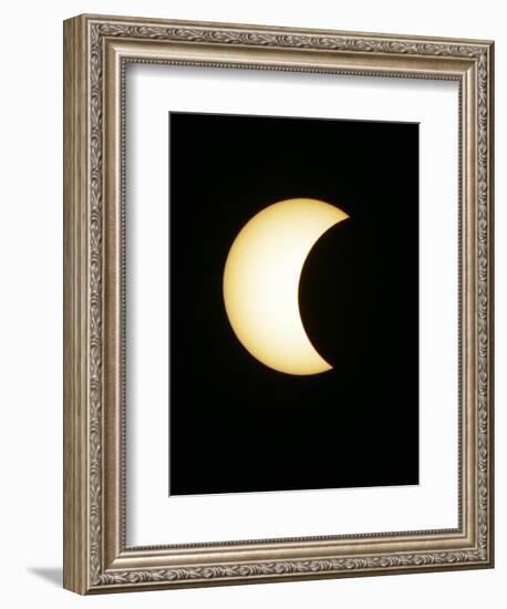 The Moon Partially Covers the Sun During the Peak of an Annular Eclipse Seen from Tel Aviv-null-Framed Photographic Print