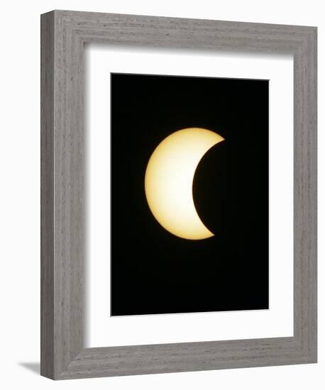 The Moon Partially Covers the Sun During the Peak of an Annular Eclipse Seen from Tel Aviv-null-Framed Photographic Print