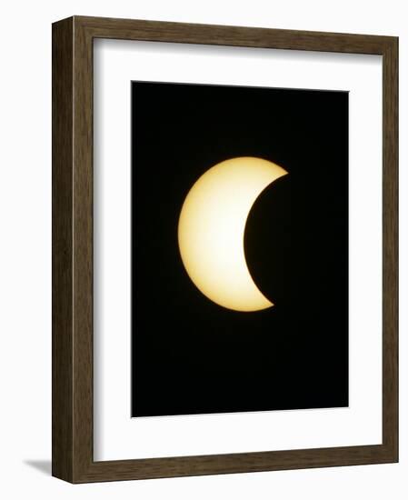 The Moon Partially Covers the Sun During the Peak of an Annular Eclipse Seen from Tel Aviv-null-Framed Photographic Print