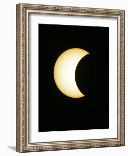 The Moon Partially Covers the Sun During the Peak of an Annular Eclipse Seen from Tel Aviv-null-Framed Photographic Print