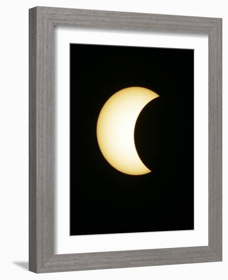 The Moon Partially Covers the Sun During the Peak of an Annular Eclipse Seen from Tel Aviv-null-Framed Photographic Print