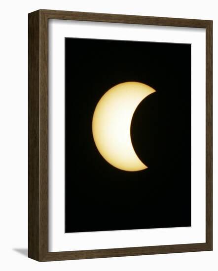 The Moon Partially Covers the Sun During the Peak of an Annular Eclipse Seen from Tel Aviv-null-Framed Photographic Print