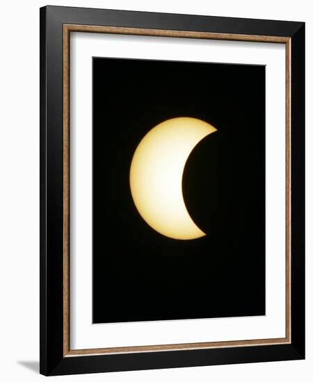 The Moon Partially Covers the Sun During the Peak of an Annular Eclipse Seen from Tel Aviv-null-Framed Photographic Print