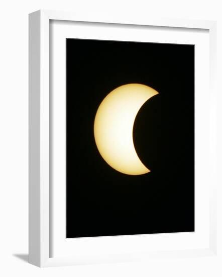 The Moon Partially Covers the Sun During the Peak of an Annular Eclipse Seen from Tel Aviv-null-Framed Photographic Print