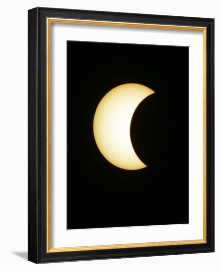 The Moon Partially Covers the Sun During the Peak of an Annular Eclipse Seen from Tel Aviv-null-Framed Photographic Print