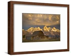 The Moulton Barn on Mormon Row Stands before a Fiery Sunrise in Grand Teton National Park, Wyoming-Mike Cavaroc-Framed Photographic Print