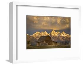 The Moulton Barn on Mormon Row Stands before a Fiery Sunrise in Grand Teton National Park, Wyoming-Mike Cavaroc-Framed Photographic Print