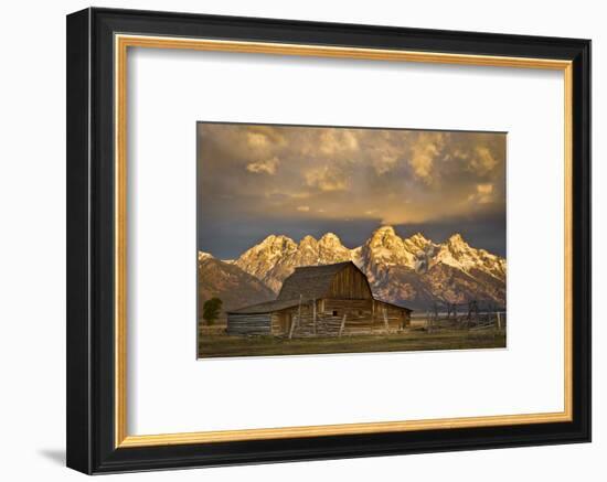 The Moulton Barn on Mormon Row Stands before a Fiery Sunrise in Grand Teton National Park, Wyoming-Mike Cavaroc-Framed Photographic Print