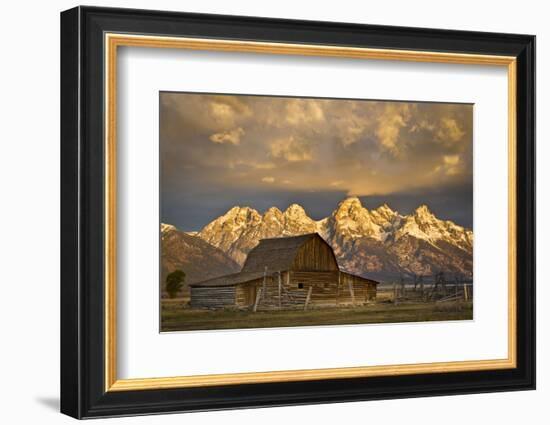 The Moulton Barn on Mormon Row Stands before a Fiery Sunrise in Grand Teton National Park, Wyoming-Mike Cavaroc-Framed Photographic Print