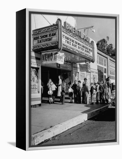 The Movie Theater Boosting Business by Caring For Child Customers on the Weekends-Allan Grant-Framed Premier Image Canvas