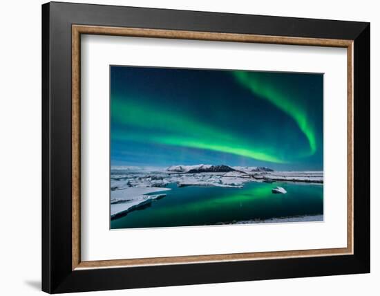 The Northern Lights Dance over the Glacier Lagoon in Iceland.-John A Davis-Framed Photographic Print