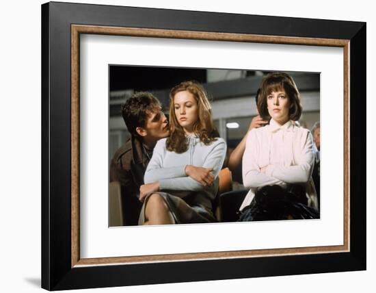 THE OUTSIDERS, 1982 directed by FRANCIS FORD COPPOLA Matt Dillon, Diane Lane and Michelle Meyrink (-null-Framed Photo