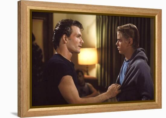 THE OUTSIDERS, 1982 directed by FRANCIS FORD COPPOLA Patrick Swayze and Thomas C. Howell (photo)-null-Framed Stretched Canvas