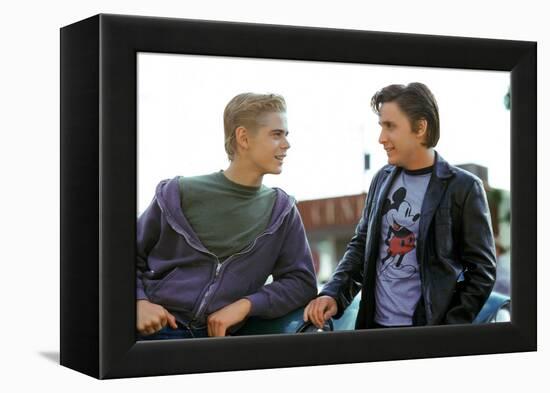 THE OUTSIDERS, 1982 directed by FRANCIS FORD COPPOLA Thomas C. Howell and Emilio Estevez (photo)-null-Framed Stretched Canvas