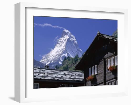 The Peak of the Matterhorn Mountain Towering Above Chalet Rooftops, Swiss Alps, Switzerland-Ruth Tomlinson-Framed Photographic Print