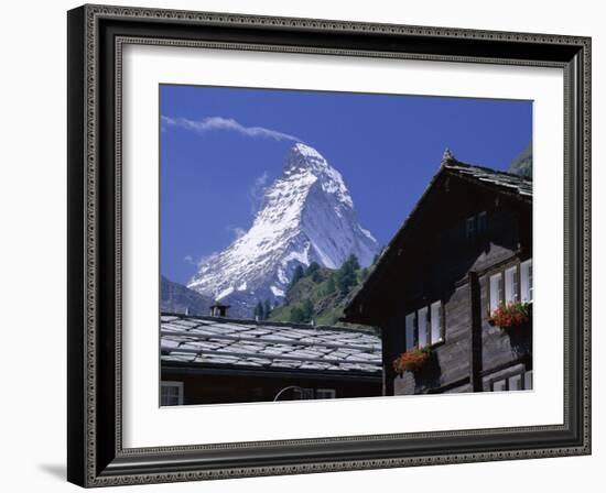 The Peak of the Matterhorn Mountain Towering Above Chalet Rooftops, Swiss Alps, Switzerland-Ruth Tomlinson-Framed Photographic Print