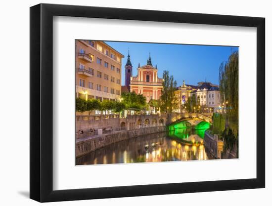 The pink Franciscan Church of the Annunciation, Ljubljanica River and the Triple Bridge, Slovenia-Neale Clark-Framed Photographic Print