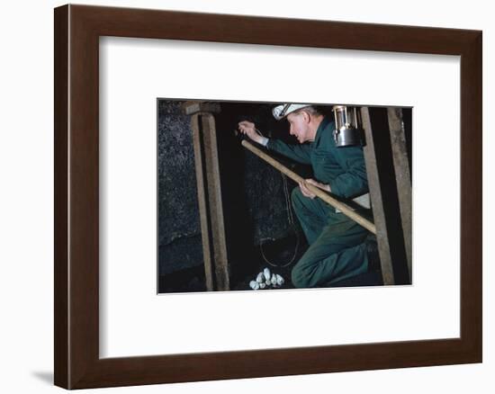 The Pit Deputy prepares for shot firing-CM Dixon-Framed Photographic Print