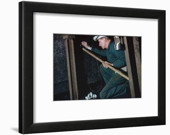 The Pit Deputy prepares for shot firing-CM Dixon-Framed Photographic Print