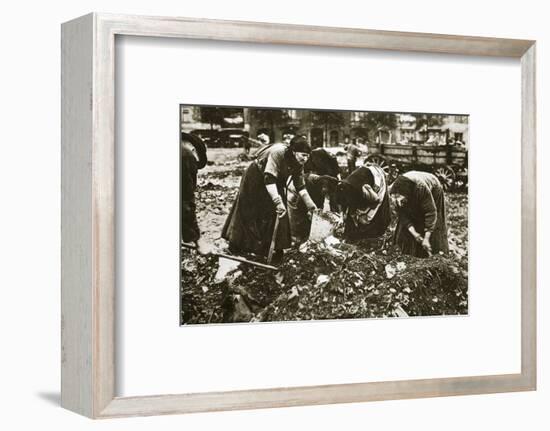 The poor of Berlin rummaging in refuse heaps, Germany, c1914-c1918-Unknown-Framed Photographic Print