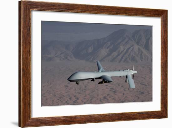 The Predator Drone Carrying Hellfire Missiles in Flight, Dec. 16, 2008-null-Framed Photo