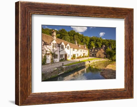 The pretty Cotswolds village of Castle Combe, north Wiltshire, England, United Kingdom, Europe-Julian Elliott-Framed Photographic Print