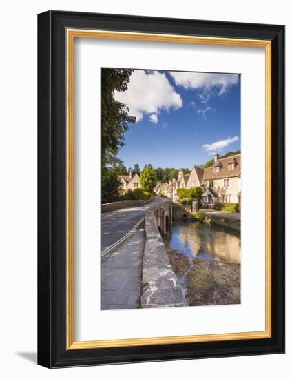 The pretty Cotswolds village of Castle Combe, north Wiltshire, England, United Kingdom, Europe-Julian Elliott-Framed Photographic Print