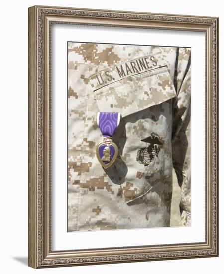 The Purple Heart Award Hangs over the Heart of a U.S. Marine-Stocktrek Images-Framed Photographic Print