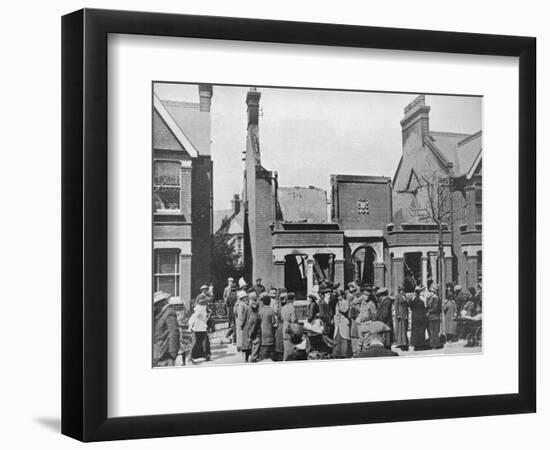 'The result of an air raid: A wrecked house in Southend', 1915-Unknown-Framed Photographic Print