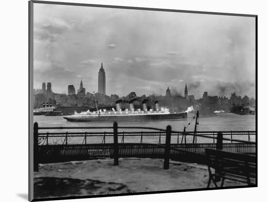 The S.S. Mauretania and New York City Skyline-null-Mounted Photographic Print