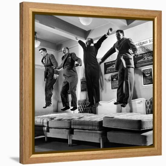 The Salesmen Showing How Not to Test a Bed at Lewis and Conger-George Silk-Framed Premier Image Canvas