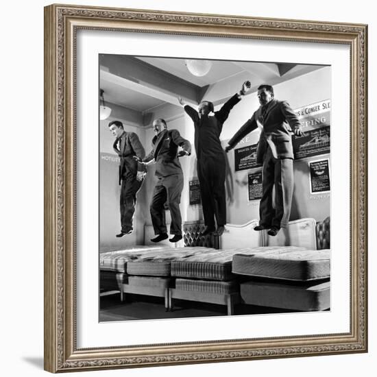 The Salesmen Showing How Not to Test a Bed at Lewis and Conger-George Silk-Framed Photographic Print