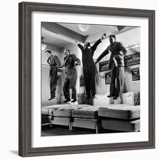 The Salesmen Showing How Not to Test a Bed at Lewis and Conger-George Silk-Framed Photographic Print