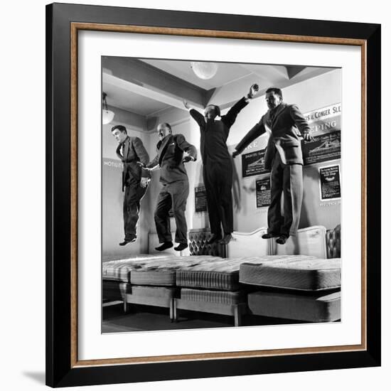 The Salesmen Showing How Not to Test a Bed at Lewis and Conger-George Silk-Framed Photographic Print