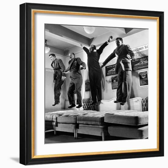 The Salesmen Showing How Not to Test a Bed at Lewis and Conger-George Silk-Framed Photographic Print