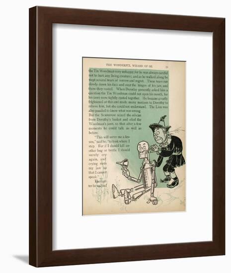 The Scarecrow Oils the Tin Woodman's Jaws after His Tears Cause Them to Rust-null-Framed Art Print