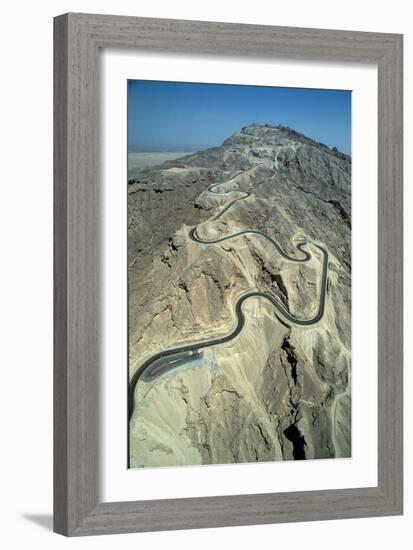 The serpentine new road to the summit of Jebel Hafit mountain near the al-'Ain oasis-Werner Forman-Framed Giclee Print