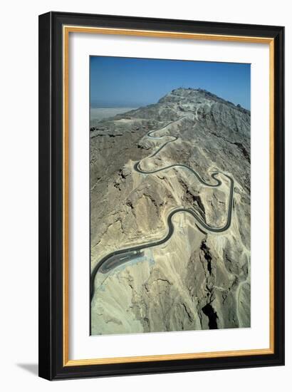 The serpentine new road to the summit of Jebel Hafit mountain near the al-'Ain oasis-Werner Forman-Framed Giclee Print