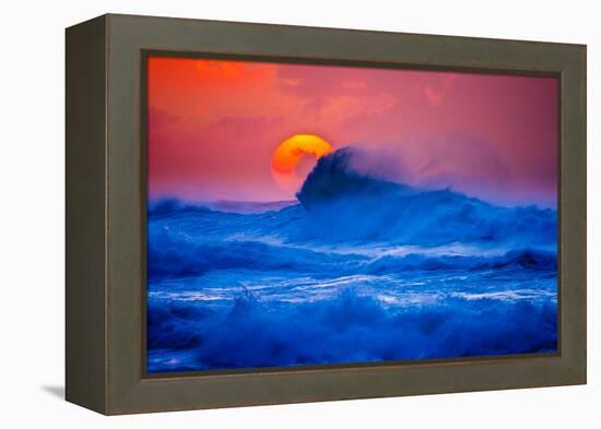 The setting sun and large winter waves breaking off the north coast of Kauai, Hawaii-Mark A Johnson-Framed Premier Image Canvas