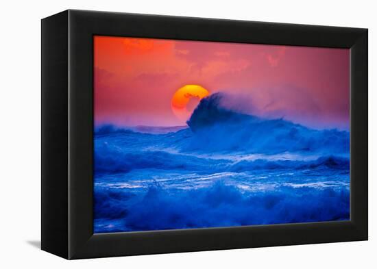 The setting sun and large winter waves breaking off the north coast of Kauai, Hawaii-Mark A Johnson-Framed Premier Image Canvas