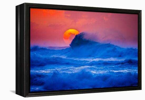 The setting sun and large winter waves breaking off the north coast of Kauai, Hawaii-Mark A Johnson-Framed Premier Image Canvas