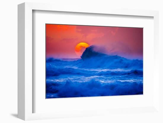 The setting sun and large winter waves breaking off the north coast of Kauai, Hawaii-Mark A Johnson-Framed Photographic Print