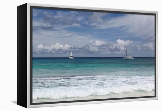 The Seychelles, La Digue, Anse Coco, Two Catamaran Yachtsmen-Catharina Lux-Framed Premier Image Canvas