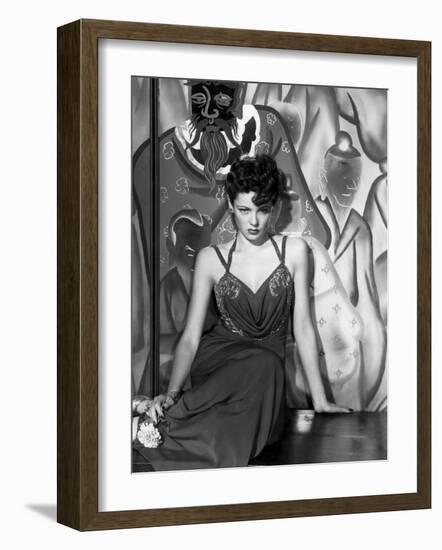 The Shanghai Gesture, Gene Tierney Wearing a Costume Designed by Oleg Cassini, 1941-null-Framed Photo