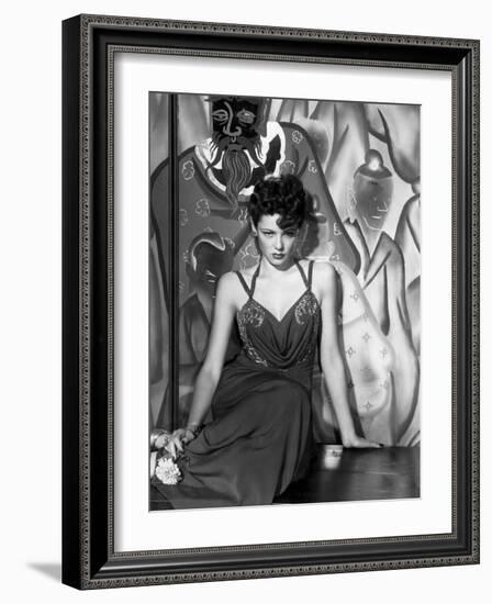 The Shanghai Gesture, Gene Tierney Wearing a Costume Designed by Oleg Cassini, 1941-null-Framed Photo