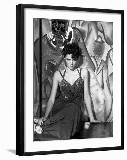 The Shanghai Gesture, Gene Tierney Wearing a Costume Designed by Oleg Cassini, 1941-null-Framed Photo