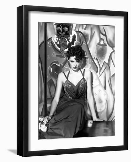 The Shanghai Gesture, Gene Tierney (Wearing a Costume Designed by Oleg Cassini), 1941-null-Framed Photo